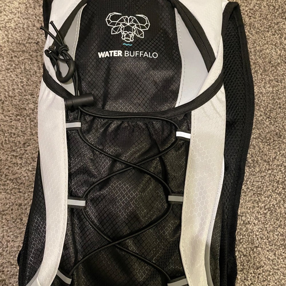water Buffalo water bladder and pack, like new, great for hiking or walking